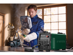PARKSIDE® Inverter Flux Cored Wire Welder in use, welding metal with sparks and smoke.