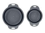 Two gray collapsible silicone colanders, one larger than the other.