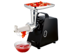 Черна електрическа месомелачка с приставка за домати, пълна с нарязани домати, изцеждаща сок в купа.