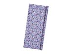 Unicorn-themed wrapping paper roll, purple background with pastel unicorns, rainbows, hearts and stars.