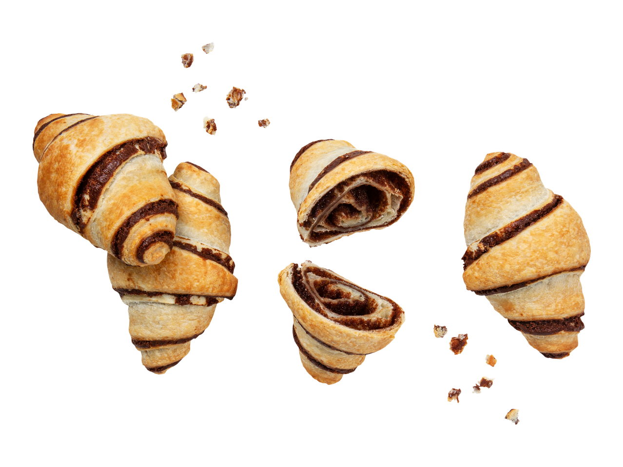 Suklaatäytteisiä croissantteja ja murusia mustalla taustalla.