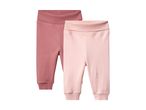 Two pairs of baby leggings, one in dusty rose and one in light pink.
