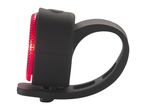 A black bicycle rear light with a red LED lens.