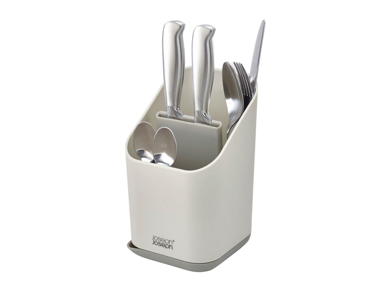 A white Joseph Joseph knife block holds several knives.