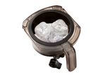 Ice maker with ice cubes inside, viewed from above.