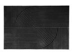 Black doormat with a textured geometric pattern of lines and curves