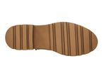 Brown lug sole of a shoe, viewed from the bottom.