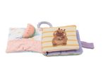 Soft baby activity book with a watermelon, capybara, and colorful pages.