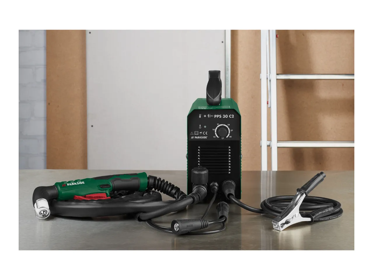 Parkside PPS 30 C2 spot welder with accessories on a metal surface.