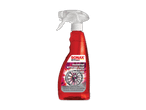 Sonax Felgenreiniger in roter Sprühflasche.