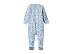 Light blue baby romper with dark and light blue polka dots.
