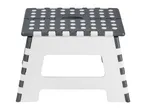 Foldable step stool in white and dark grey with anti-slip dots on the top.