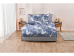 Grey platform bed with blue crane-print bedding set.