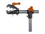 Bicycle repair stand with an orange clamp and adjustment knob