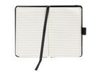 An open lined notebook with a black cover and ribbon bookmark.