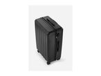 Black hard-shell suitcase with vertical ridges, a retractable handle, and four wheels.