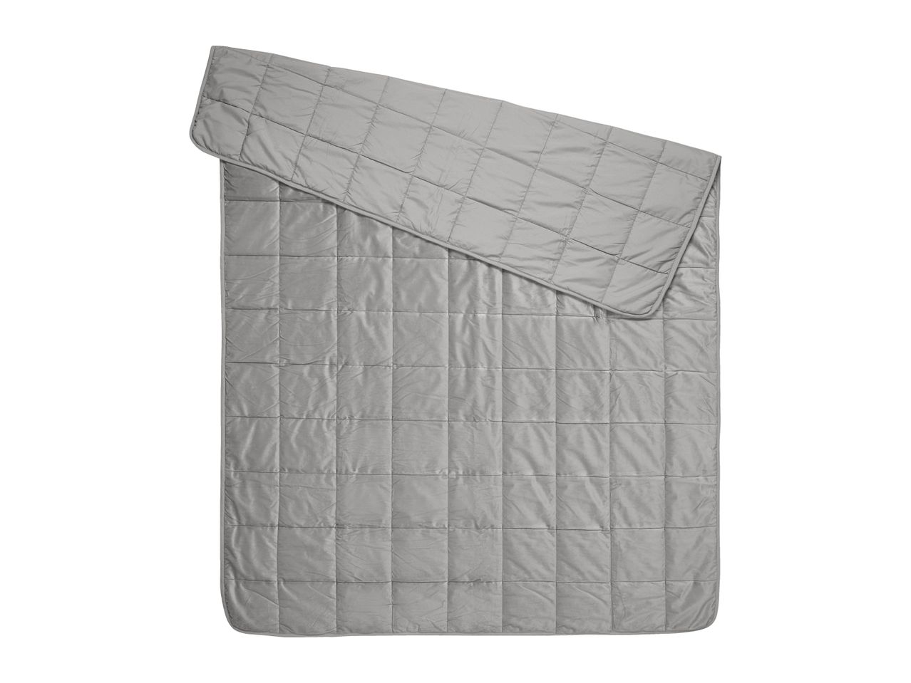 Grey quilted weighted blanket with folded top corner