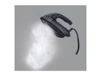 Steam iron emitting a powerful burst of steam against a grey background