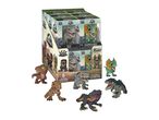 A display box of dinosaur vinyl figures, with several figures including Blue and Dilophosaurus, scattered around it.