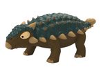 A cute, cartoonish Ankylosaurus toy.