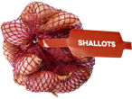 A mesh bag of shallots with a red label that reads 'SHALLOTS'.
