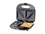 Sort sandwichmaskine med en færdiglavet toast.