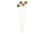 Christmas decorations: gold pine cones on wooden sticks.