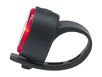 Red bicycle rear light with a black silicone strap, illuminated and angled to the left.