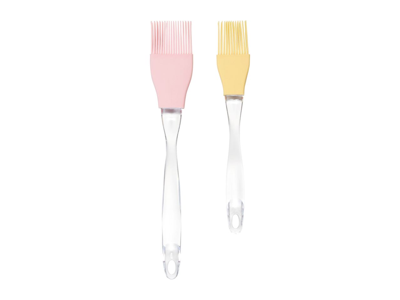 A pair of silicone pastry brushes in pink and yellow.