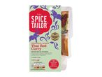 Thai Red Curry kit with spices and sauce, featuring a medium heat rating.