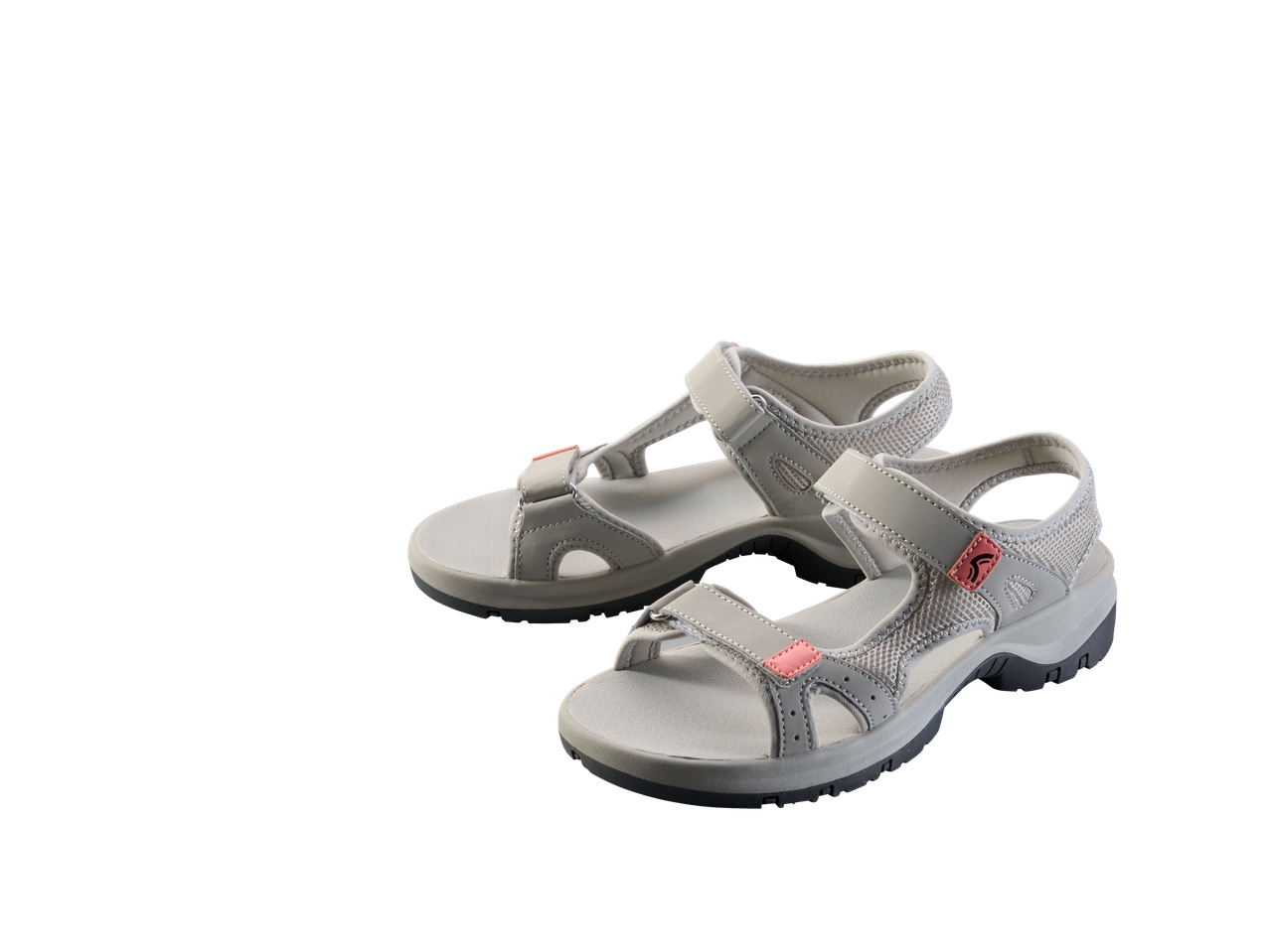 Pair of light grey women's sports sandals with pink accents on a black background.