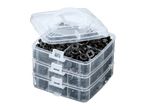Three-tier plastic organizer box filled with black plastic car rivets and fasteners