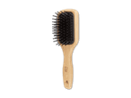 Ein Cien Beauty-Haarbürste aus Bambus mit schwarzen Borsten.