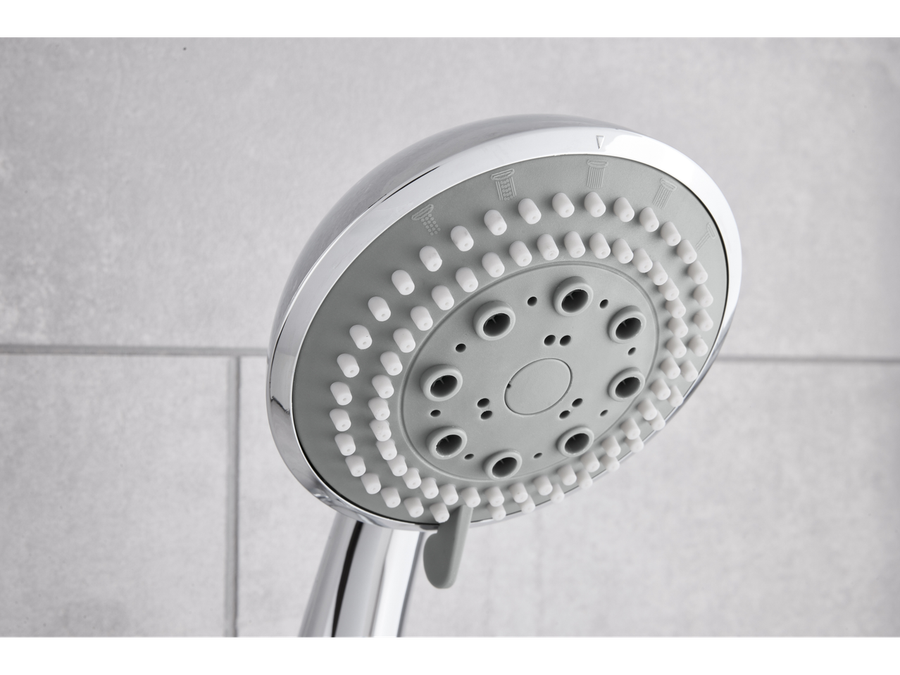 Chrome shower head with multiple spray settings.