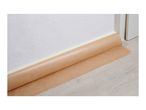 Brown masking paper with tape protecting a light wooden floor from a white wall.