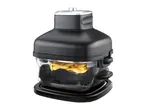 Black air fryer with a transparent basket full of golden french fries.