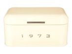 Cream retro-style bread bin with the year 1973 on the front