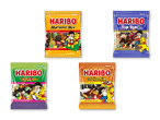 Fire Haribo-slikposer i forskellige farver og smagsvarianter, herunder Matador Mix og Top Star.