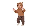 Toddler in a brown teddy bear hooded jacket and brown quilted trousers, standing and waving.