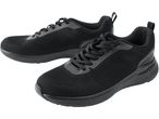 Due scarpe da ginnastica nere con lacci, una leggermente dietro l'altra.