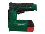 Green and black electric stapler with red accents and a battery indicator.
