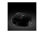 Black sandwich maker with indicator lights on a dark textured surface.