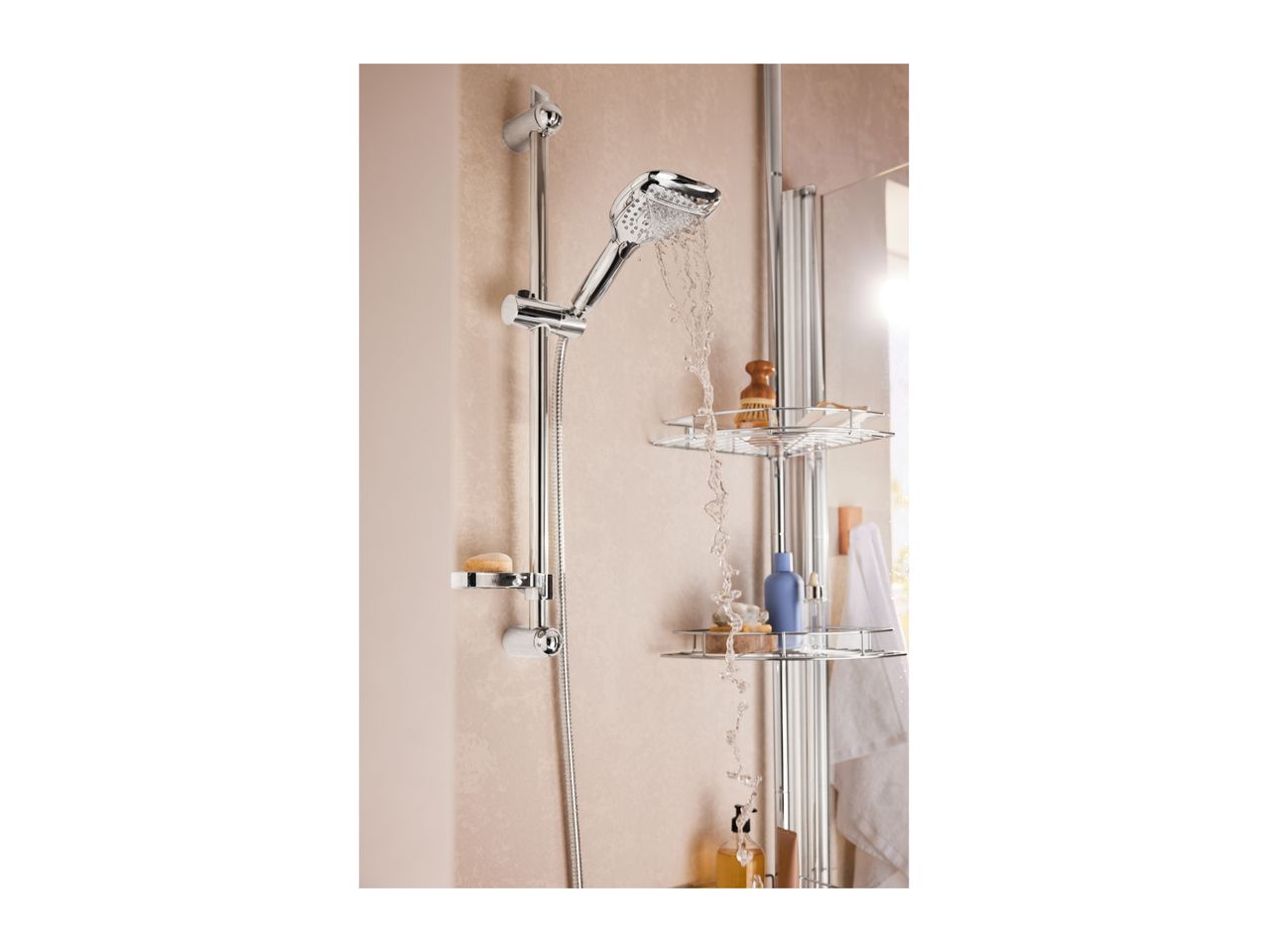 Chrome shower head with running water, shower rail, and two-tier shower caddy.