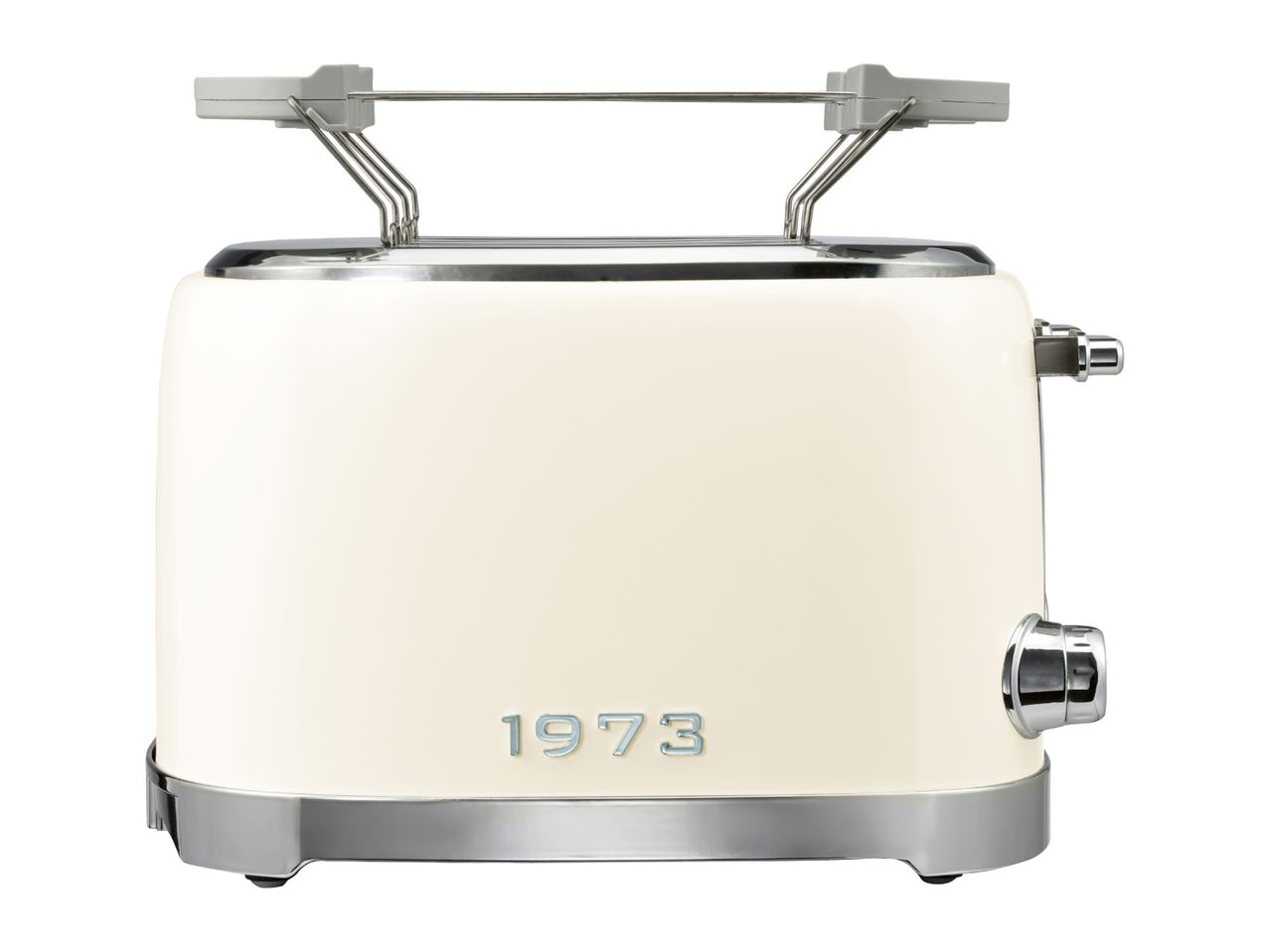 Cream-colored retro toaster with a bun warmer attachment and the year 1973 on the front