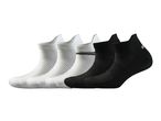 Five pairs of ankle socks, three white and two black, arranged in a row.