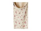 Cream-colored baby footmuff with a pink floral pattern and two white snap buttons.