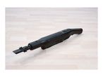 A sleek black handheld vacuum cleaner with a brush attachment on a light wooden floor.