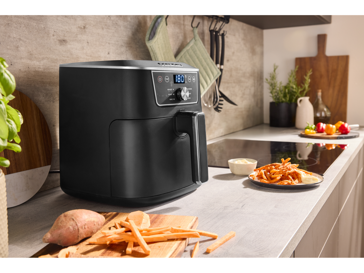 SILVERCREST® XL Air Fryer on a kitchen counter with sweet potato fries