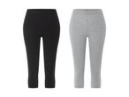 To par capri-leggings, et sort og et gråt, isoleret på hvid baggrund.