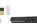 Parkside oil, measuring container, chain guide and wrench.